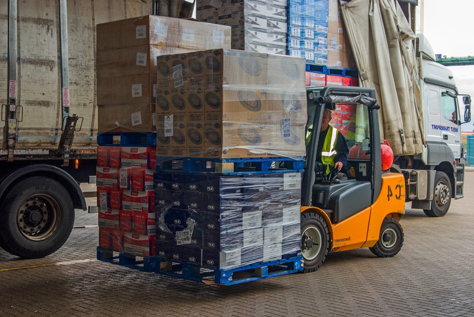 Lorry being tipped with Double handler Counter Balance.